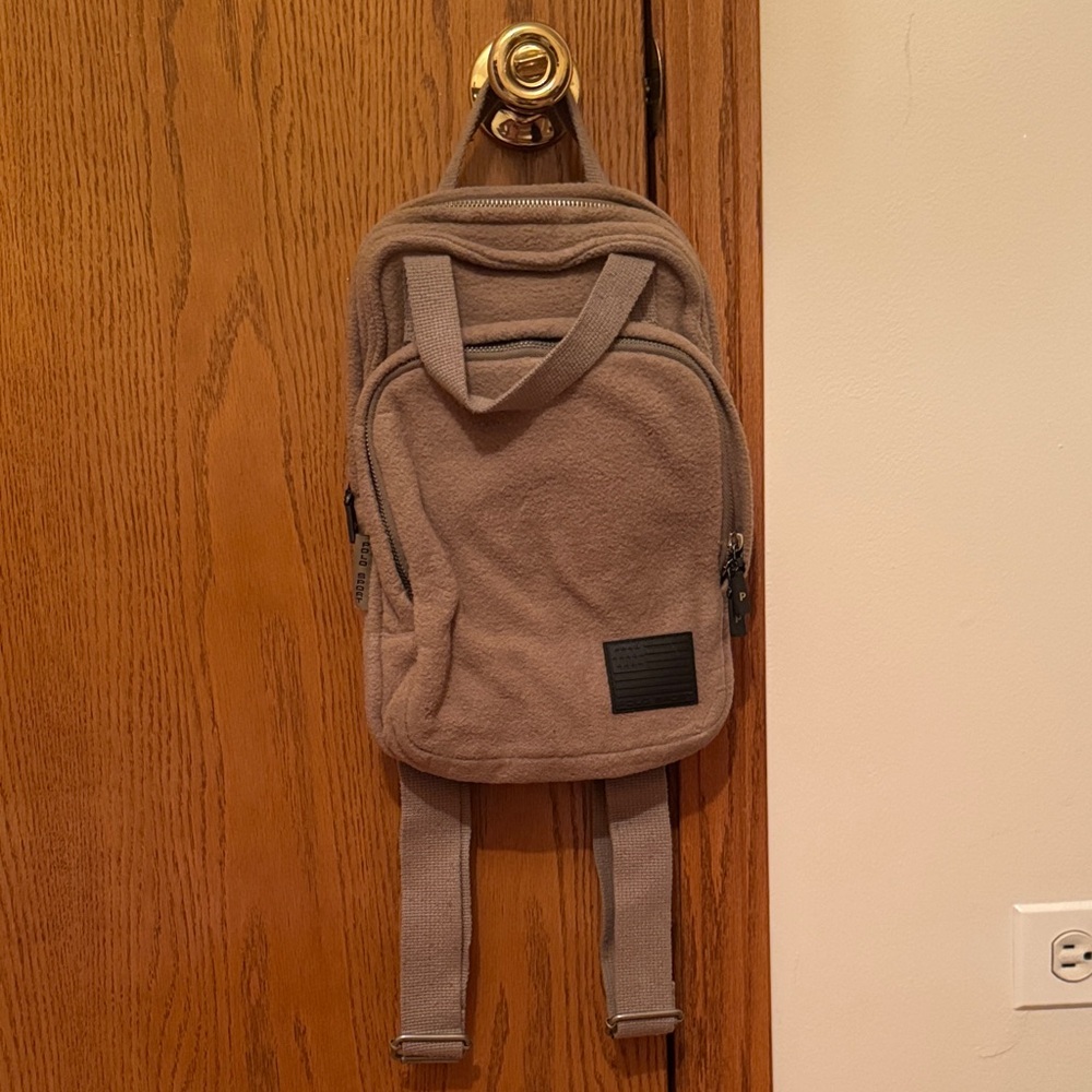 Versatile Tan Backpack With Black Patch - image 1